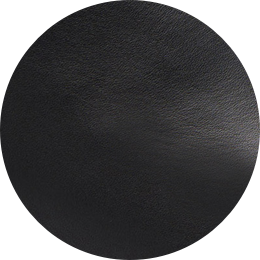 Close-up swatch of black textured leather material in a circular shape.