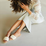 Image 4 of the Isla Slide Sandal Bone on model